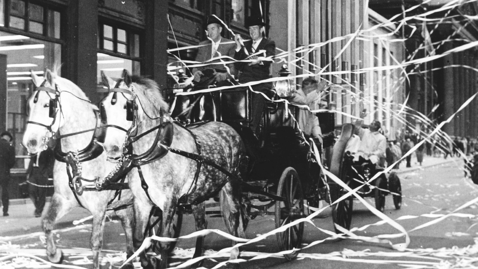 Ticker-tape parade toward the new Stock Exchange Tower