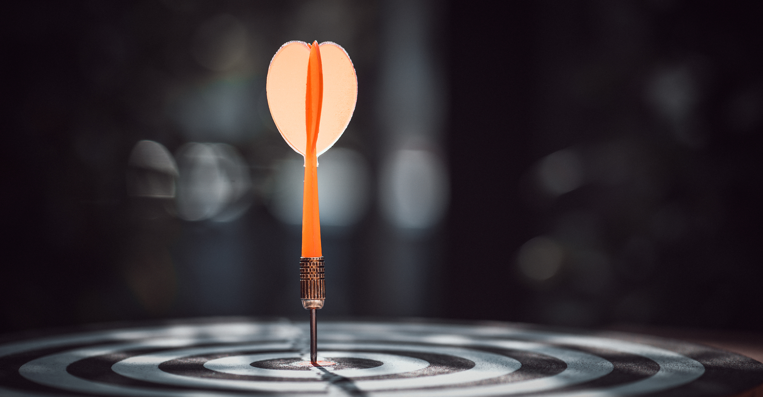 Image of dart hitting bullseye